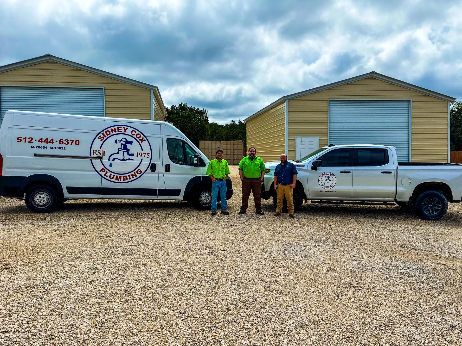 Sidney Cox Plumbing Co truck fleet and team serving Austin TX
