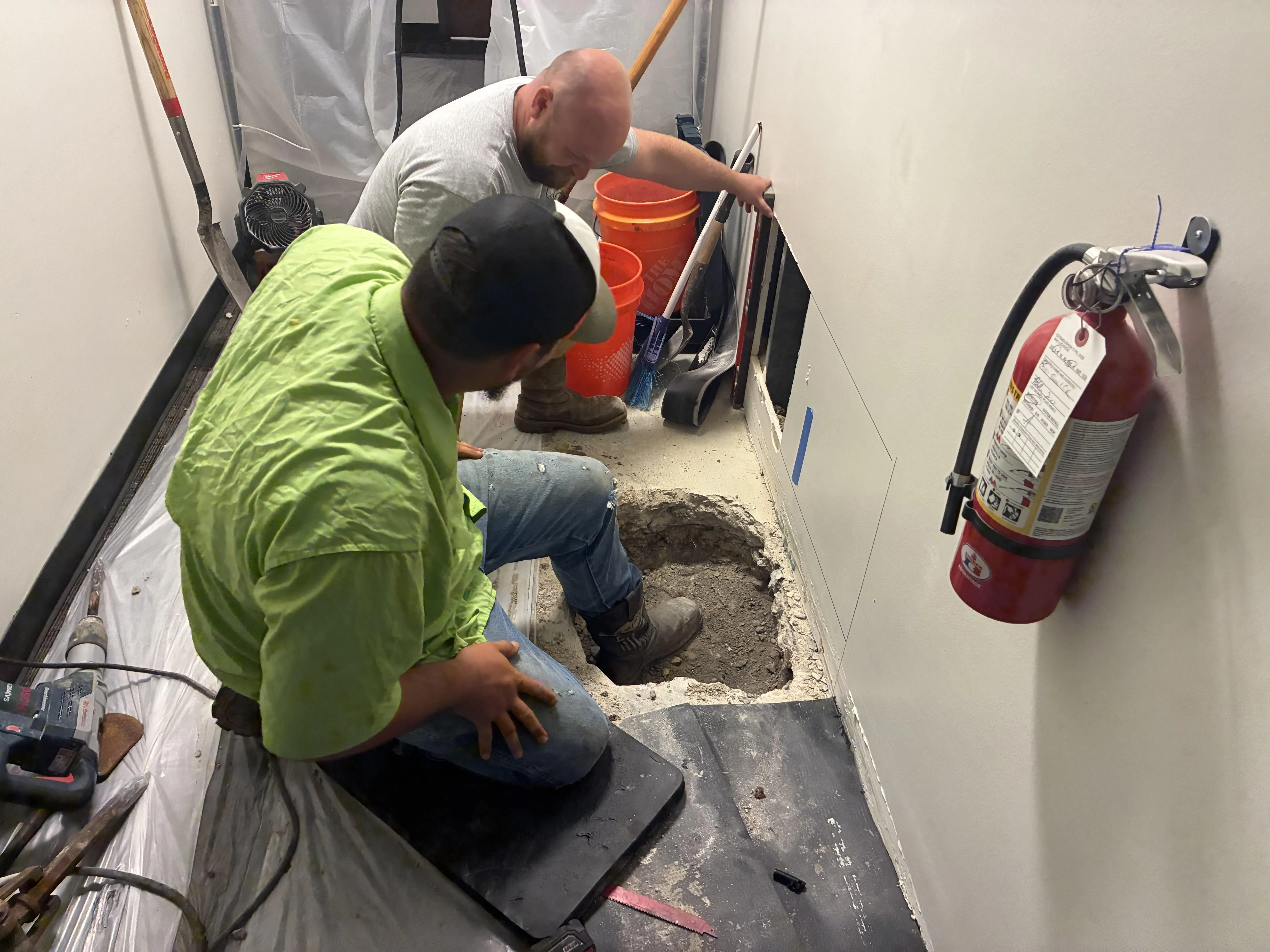 Sidney Cox Plumbing technicians performing under-slab sewer line diagnostic and repair in Austin TX